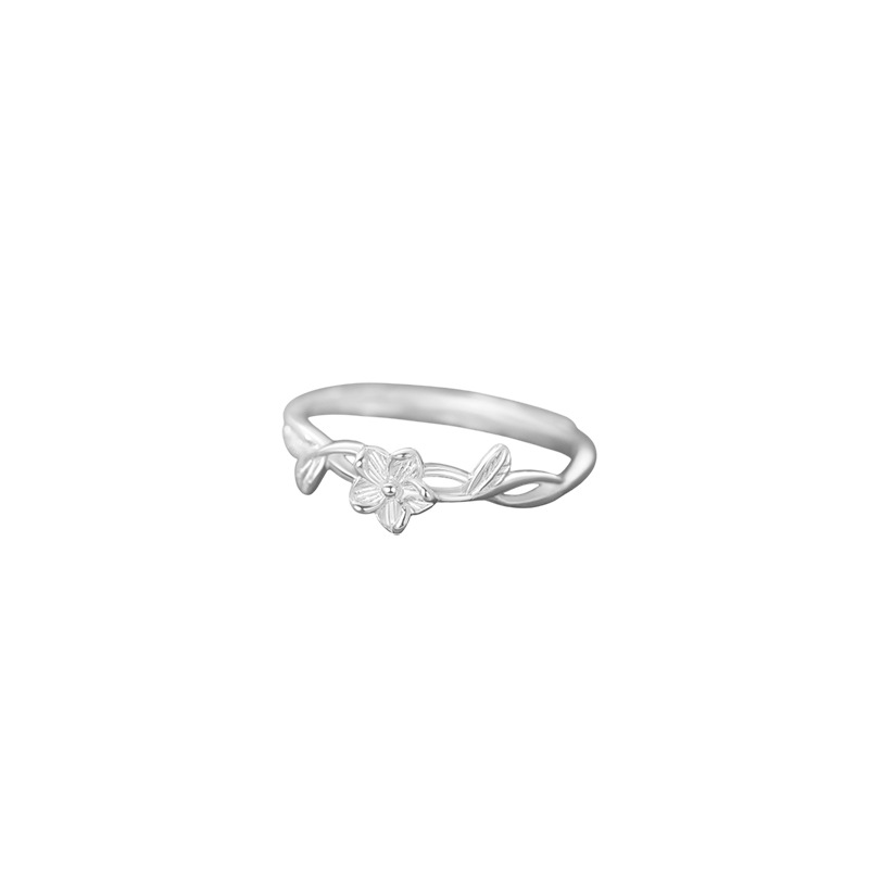 A sweet, simple, and uniquely designed floral ring; a fresh and delicate hand accessory.